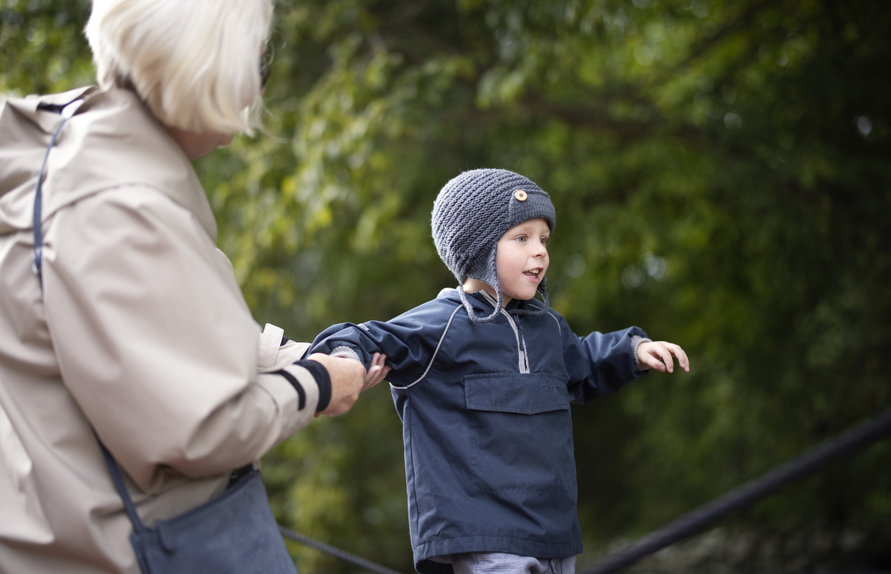 Boy with his grandmother in the park