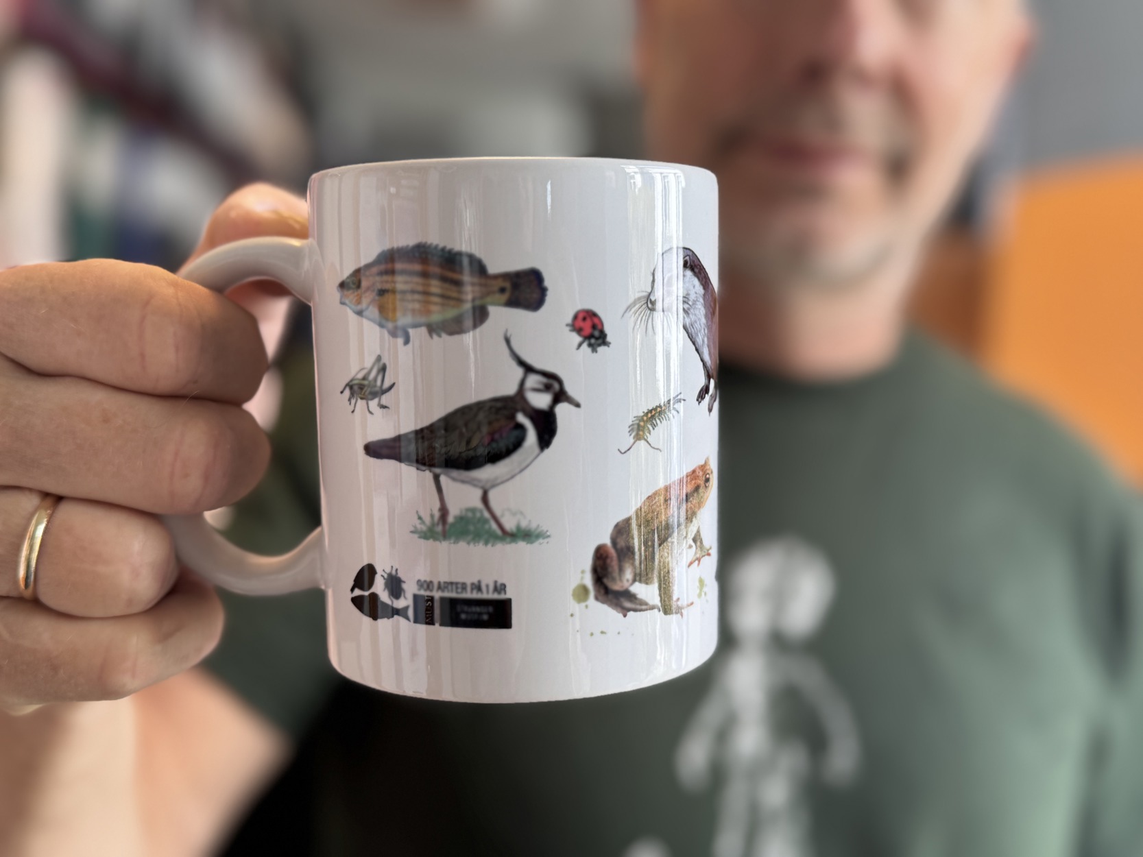 Kopp med 900-arter motiv