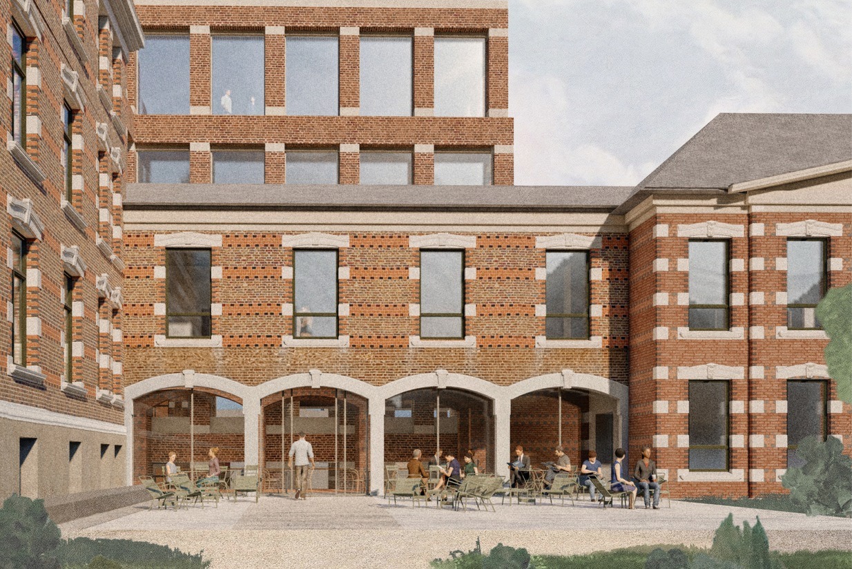 Bygg med teglstein og kafe utenfor