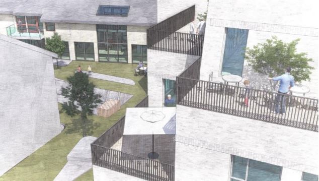 Tegning som viser sykehus bygg med balkonger og hage mellom byggene.