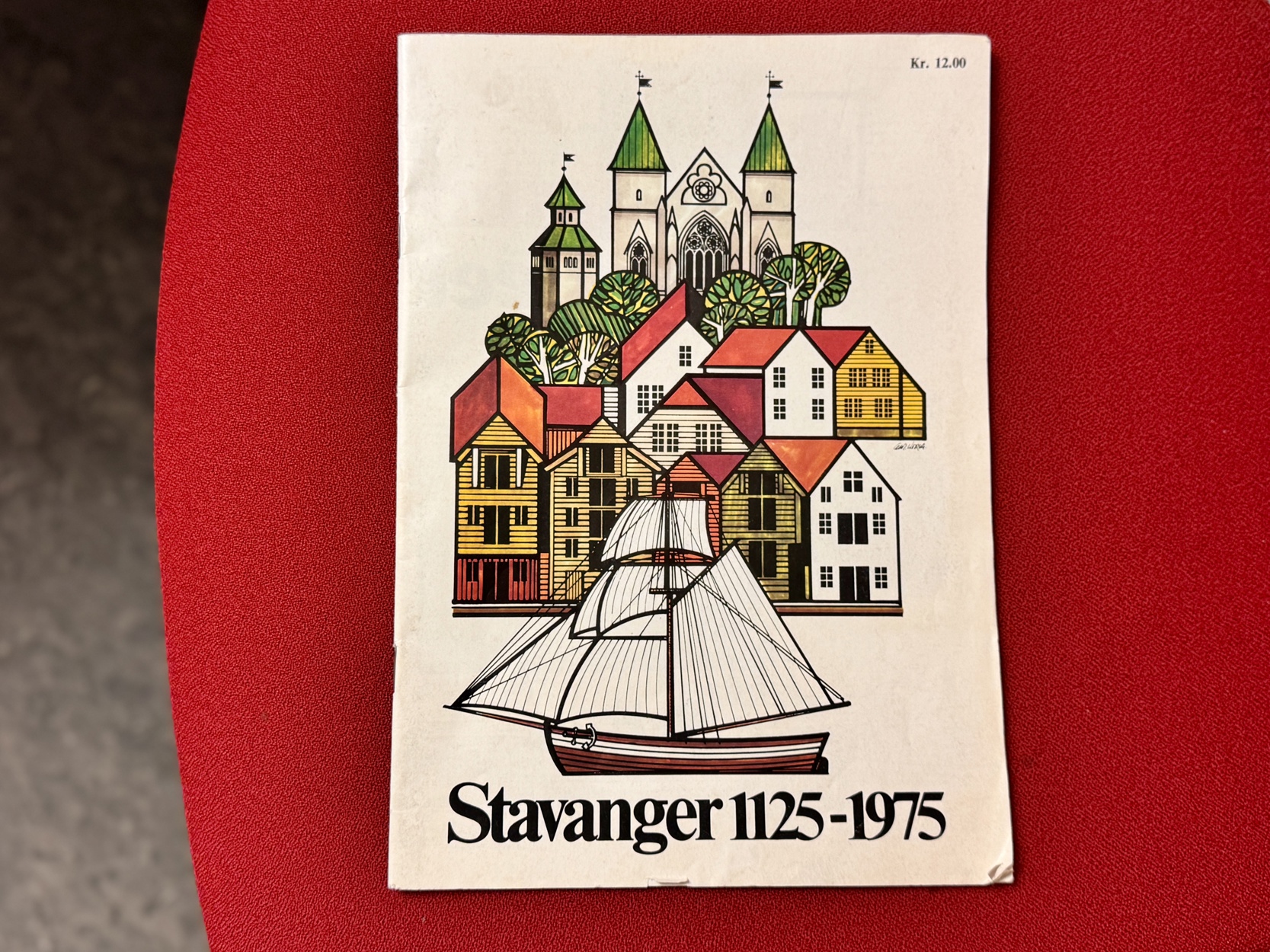 Jubileumsmotivet pryder programbladet til jubileet i 1975.