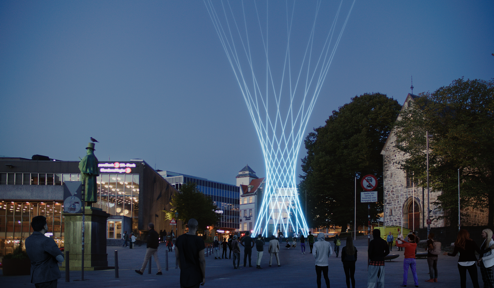 Bilde av Loussaief Tijani. Foto av Sander Eriksen.  Lys som stråler opp i himmelen ved siden av domkirken i Stavanger.