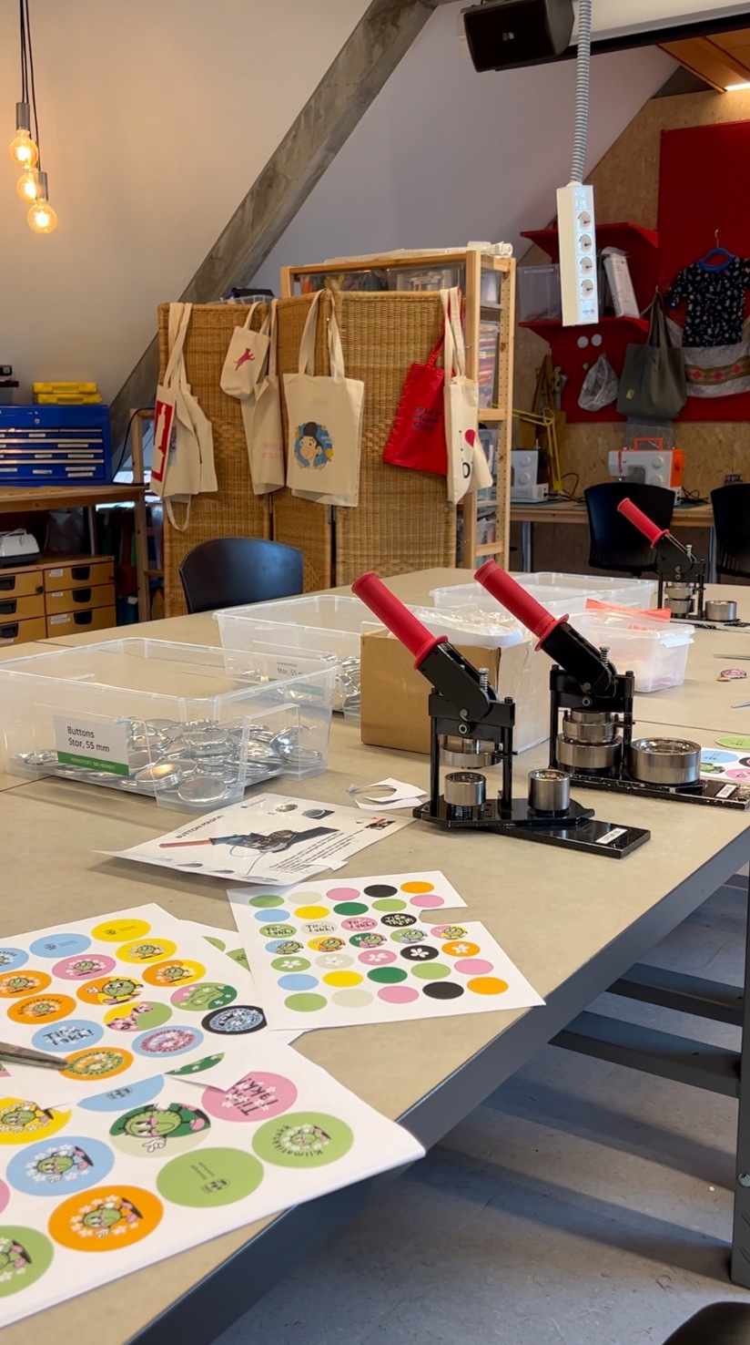 Buttonsmaskin på verkstedet på Sølvberget