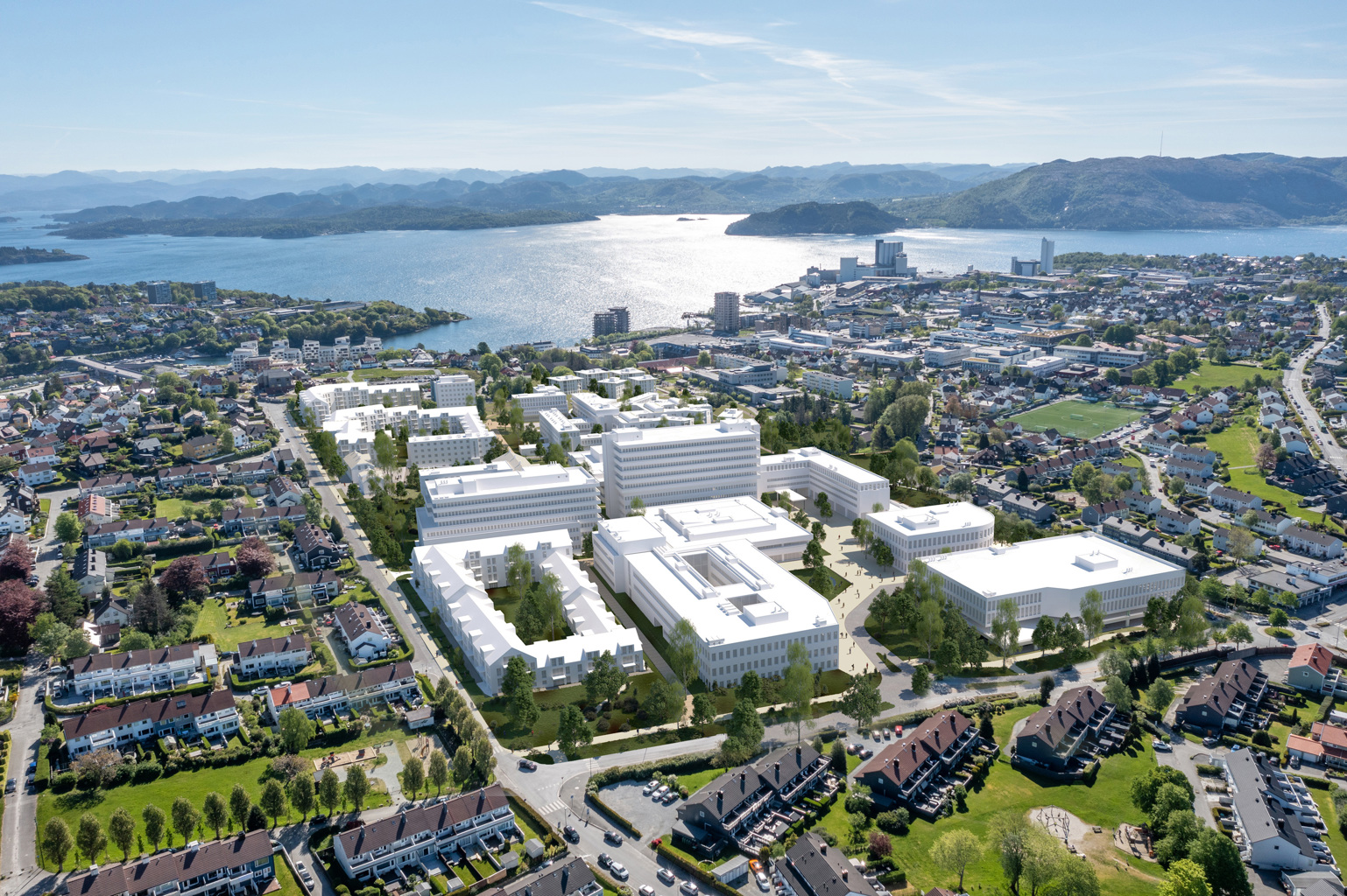 Slik kan det se ut om noen år, dersom dagens sykehusområde bygges ut i henhold til det foreslåtte planforslaget. Noen av dagens bygg beholdes, og nye bygg kan komme til. Fugleperspektiv av utbygd SUS-område noen år fram i tid, dersom området bygges ut i henhold til det foreslått planforslaget. Nye bygg er markert med hvit farge.